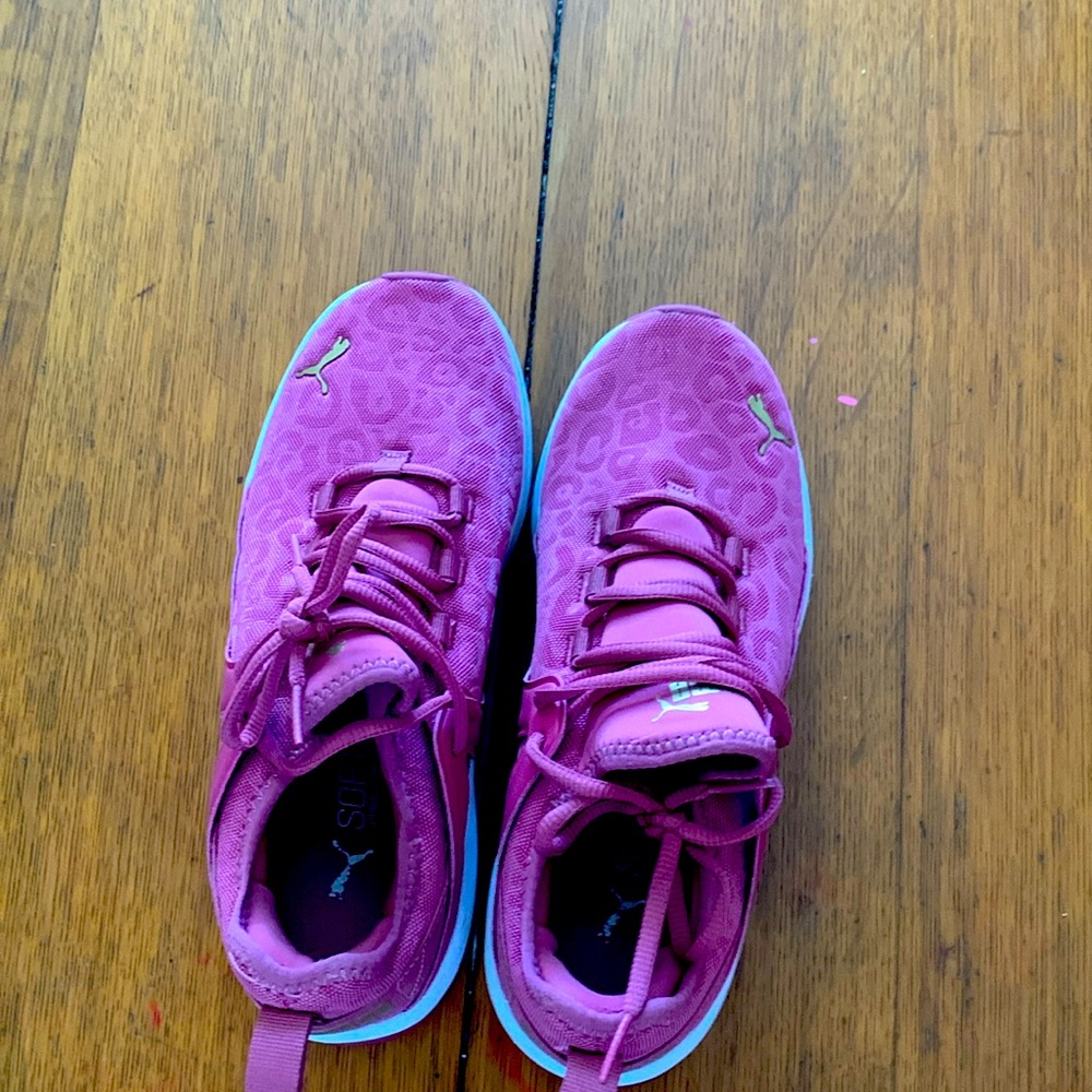 They are puma shoes the colors are pinkish purpleish